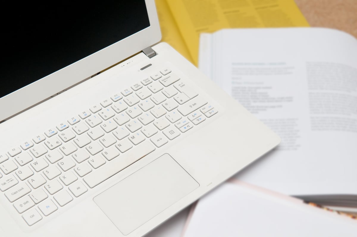 Education and business learning, laptop with books